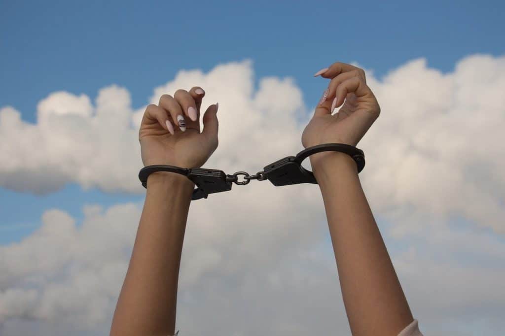 hands, handcuffs, the dependence of-1875444.jpg
